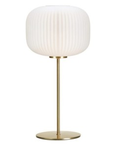 Lampe de table en verre blanc et laiton brossé, idéale pour une ambiance intérieure raffinée.