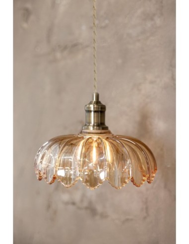 Luminaire Kurage avec verre transparent ambré, finition laiton et câble textile torsadé beige.