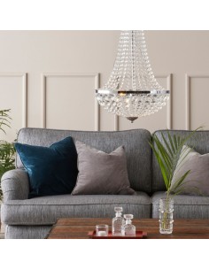 Lustre Gränsö 40 cm en fer chromé avec prismes en cristal, design élégant et lumière réfléchissante. 2