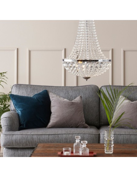 Suspension à deux ampoules E14, finition chrome et cristal, idéale pour un intérieur raffiné.