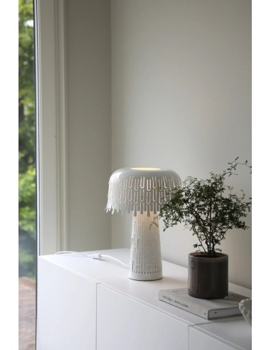 Lampe décorative blanche avec découpes lumineuses design