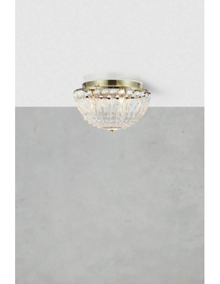 Détail plafonnier Estelle cristal diffusion lumière élégante effet luxueux salle de bain