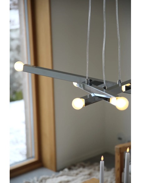 Plafonnier Stack Markslojd installé dans un salon ambiance moderne éclairage décoratif