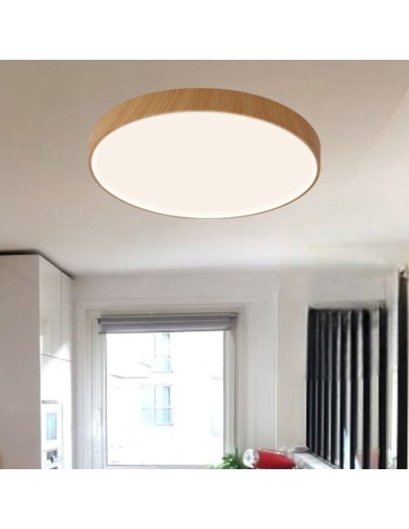 Plafonnier LED Cumbuco II blanc installé dans salon moderne lumineux